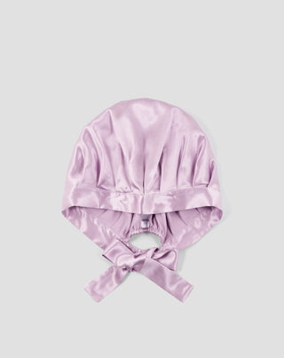 Twisty pink silk sleeping cap for curly and wavy hair